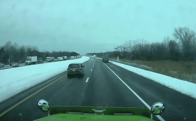 VIDEO: Car Makes Illegal U-Turn To Cut Off Truck