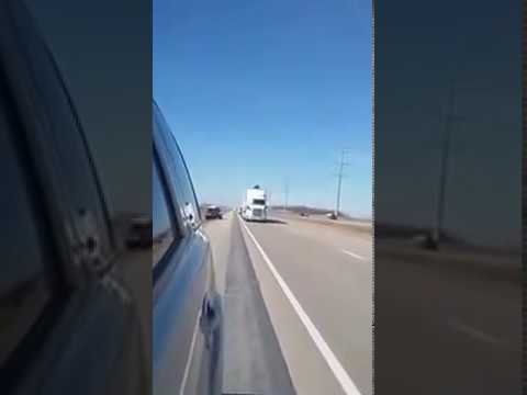 VIDEO: Man Climbs On Semi To Try To Escape Minnesota Troopers