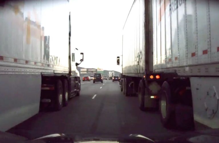VIDEO: Car Ignores Truck’s Blinker, Ends Up In Semi Sandwich