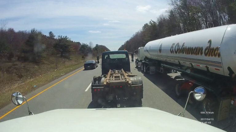 VIDEO: Roll Off Truck Is Almost Rear Ended By Semi