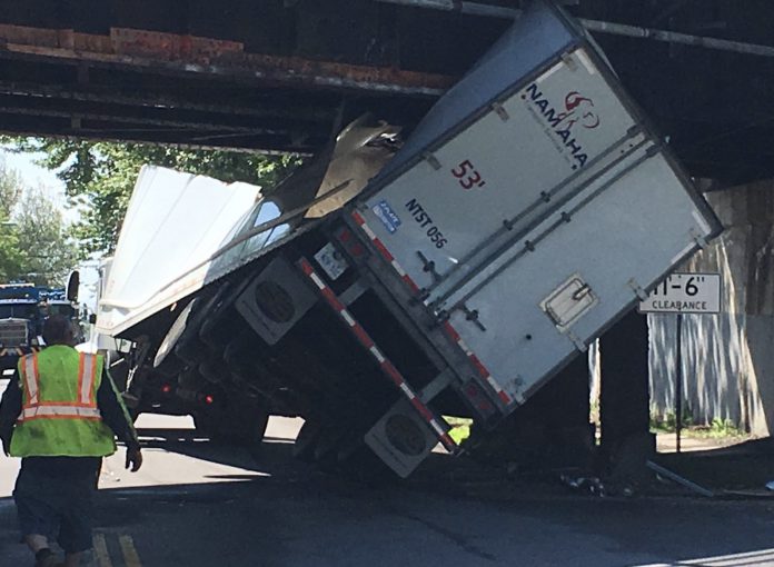 Truck Driver Runs Afoul Of Bridge On His First Day On The Job