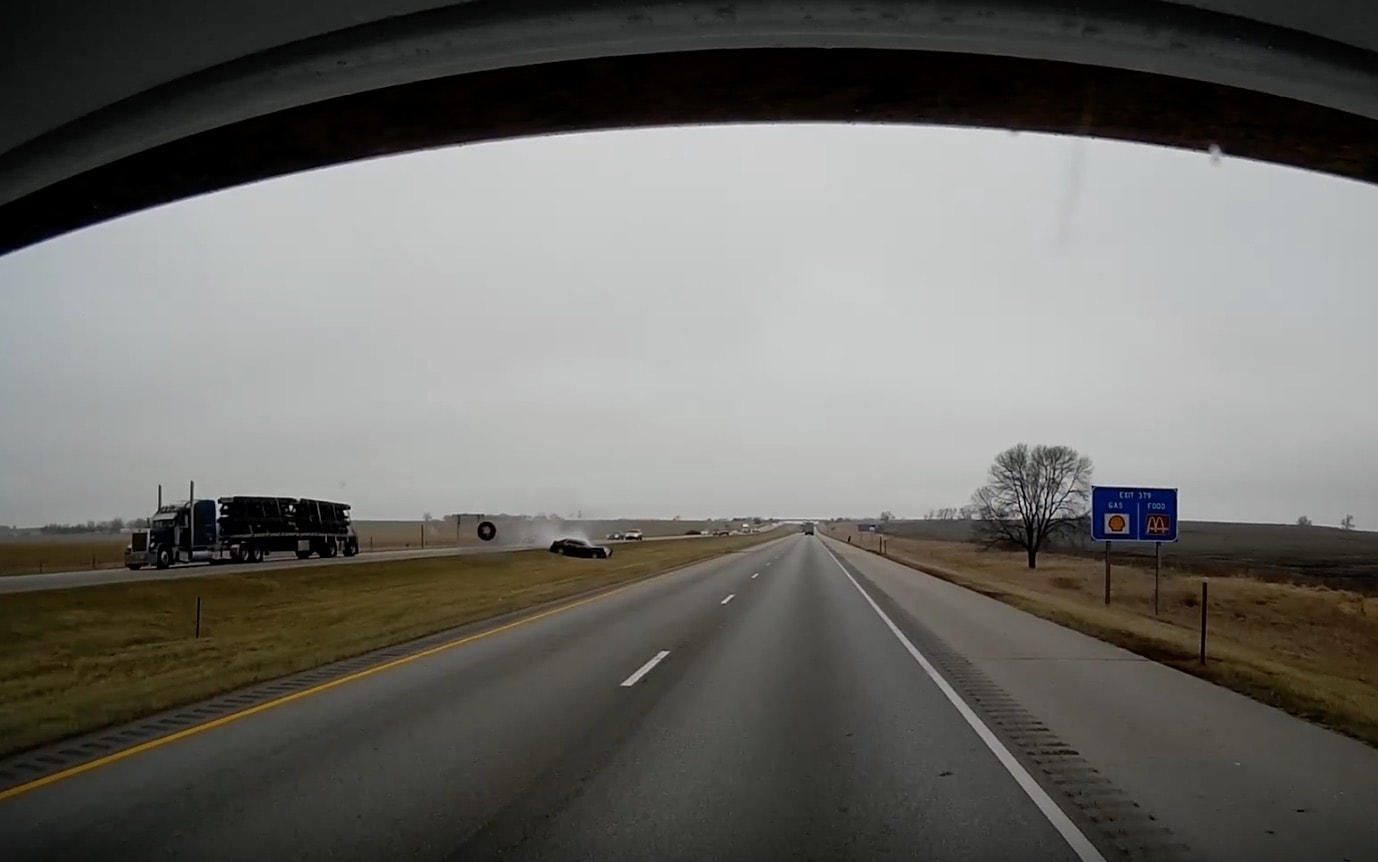 VIDEO: Rogue Semi Tire Sends Car Crashing Into Median