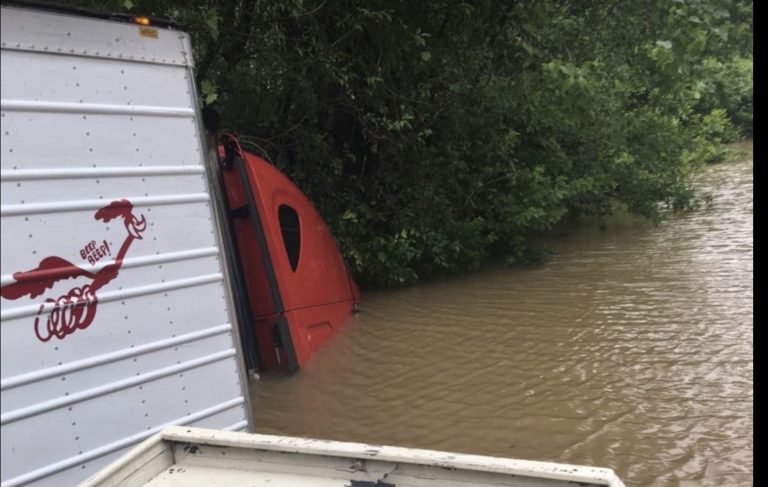 Arkansas Police Rescue Trucker Trapped By Flood Waters