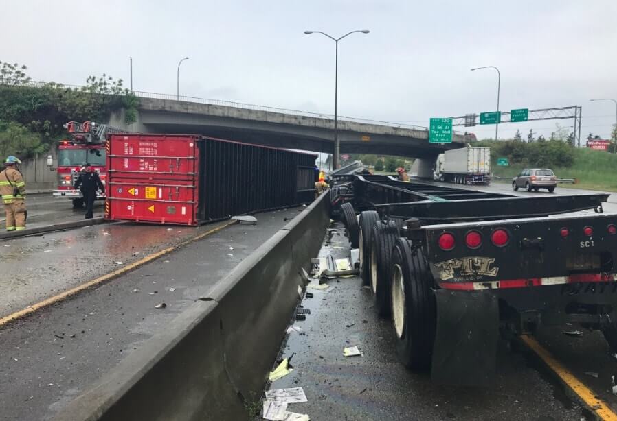 Trucker Dies After Container Detaches From Chassis, Crashes Into Cab