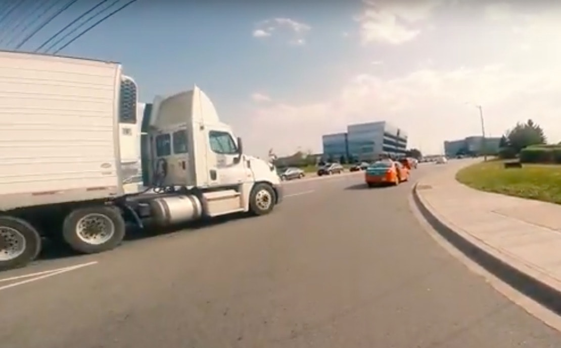 VIDEO: Cab Cuts Off Semi To Drop Off Passenger