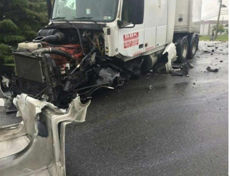Texting Car Driver Crashes Head On With Semi Truck