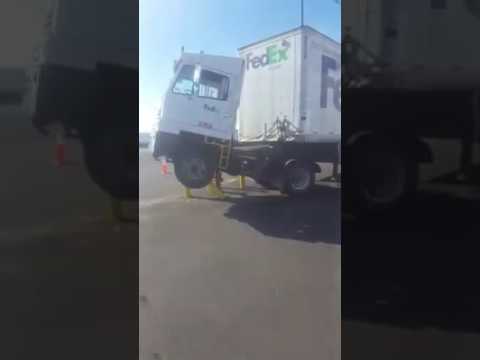 VIDEO: FedEx Yard Spotter Runs Afoul Of Poles