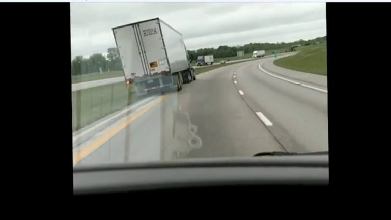 VIDEO: Semi Skids Wildly Through I-44 Median Before Rolling
