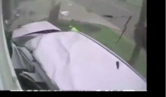 VIDEO: Car Runs Stop Sign And Sends Bus Crashing Into Building