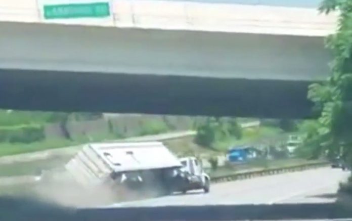 VIDEO: Tractor Trailer Topples On Pennsylvania Interstate
