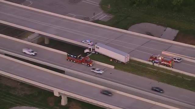 Truck Cab Hangs Off Parkway Overpass With Driver Inside