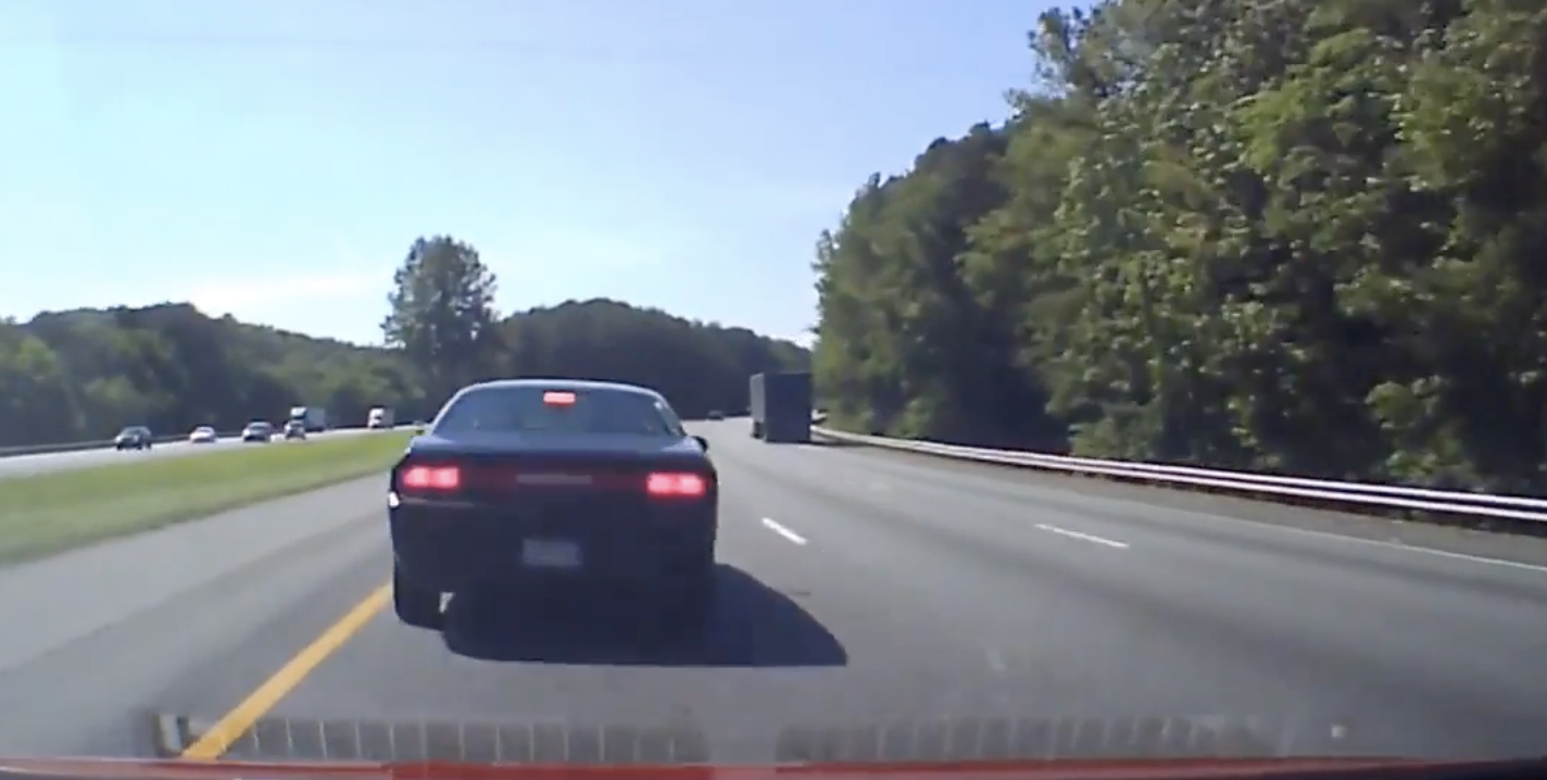 VIDEO Loose truck tire results in highway chaos