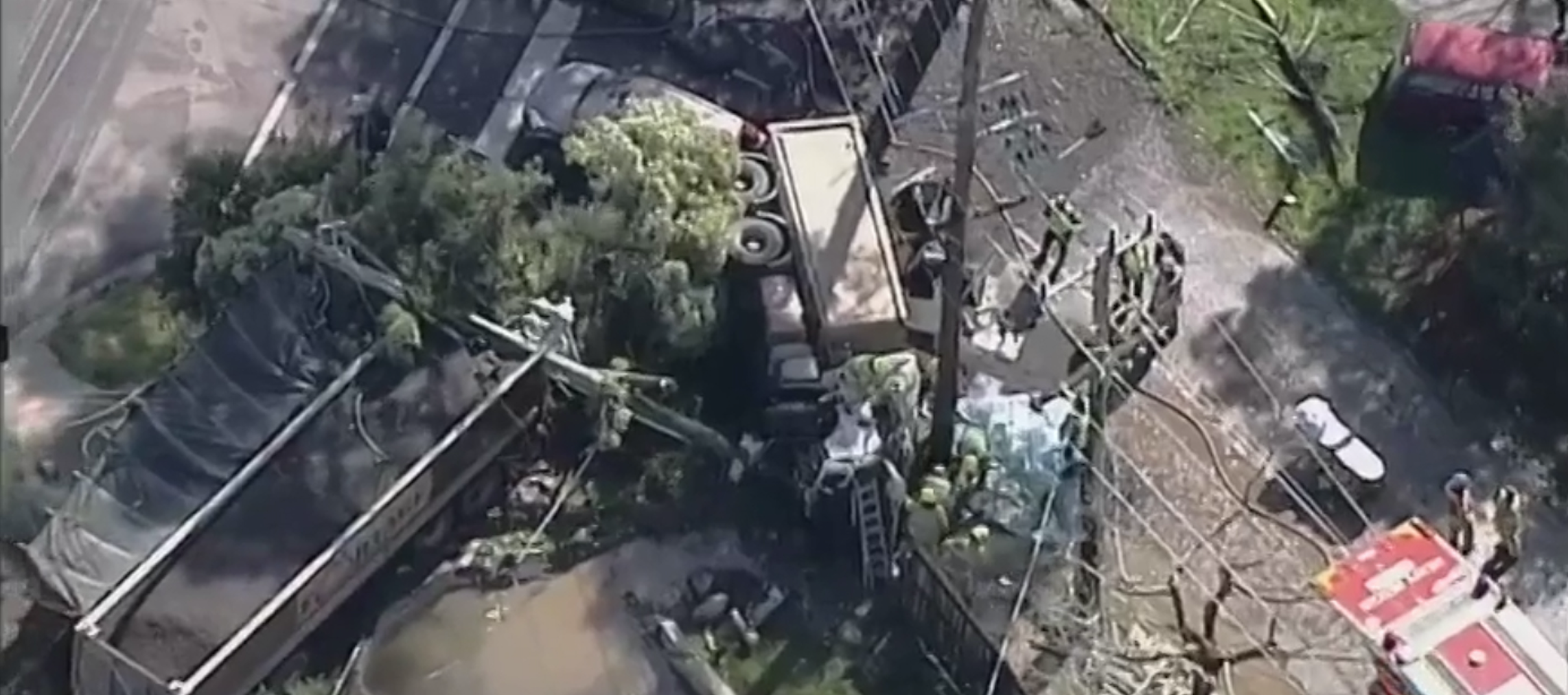 VIDEO: Trucker blacks out, drives into oncoming traffic, winds up in pool