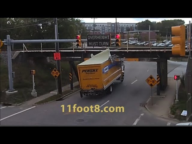 VIDEO: Speeding truck runs light and pops a wheelie at the 11 foot 8 bridge