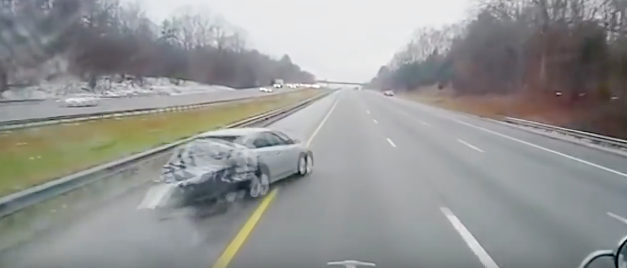 VIDEO: Car Driver Brake Checks A Semi And Pays The Price