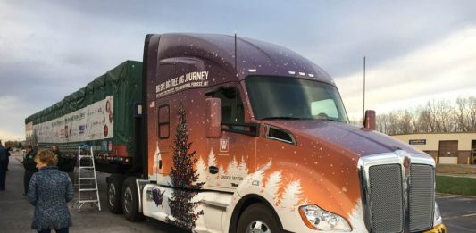 Capitol Christmas Tree makes a stop at a Kansas City Kenworth dealership