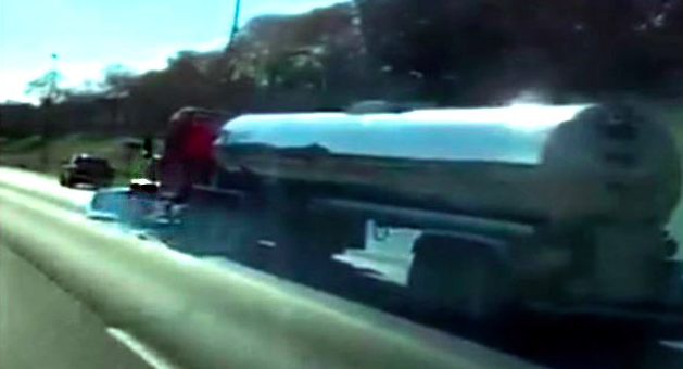 Motorist shares video of semi pushing car along I-55 in St. Louis