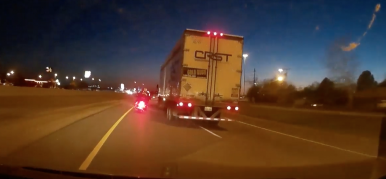 VIDEO: Motorcycle vs CRST truck on windy highway