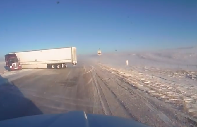 VIDEO: Semi truck jackknifes in Wyoming wind