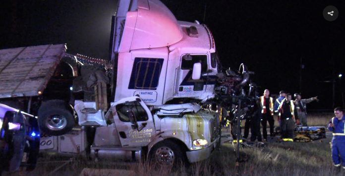 One truck runs over another in crash that leaves one dead, two hurt