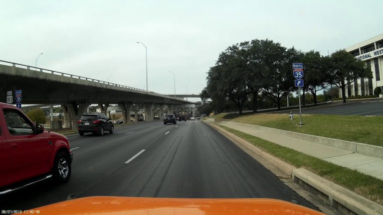 VIDEO: Semi truck with wide load changes lanes on top of cammer