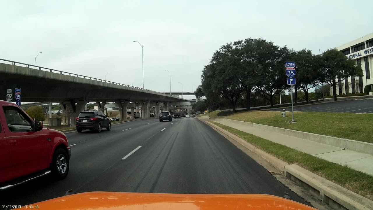 VIDEO: Semi truck with wide load changes lanes on top of cammer