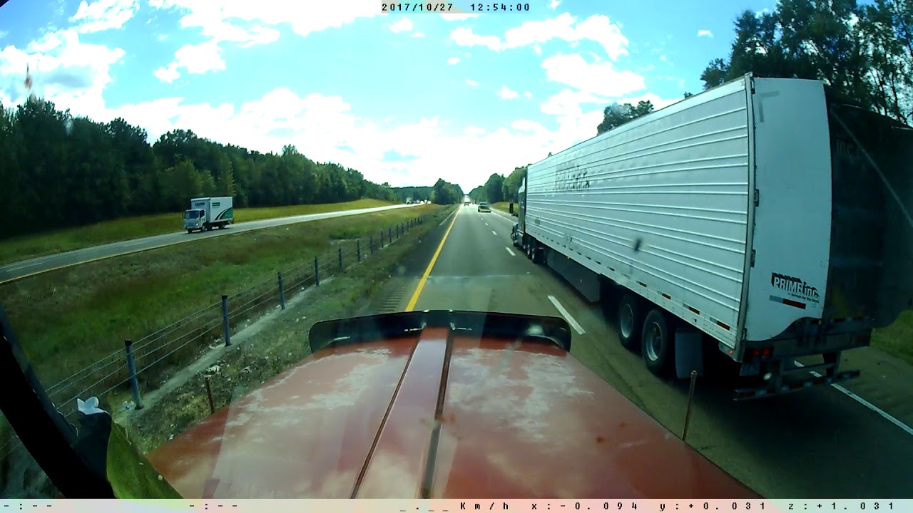 VIDEO: Pickup driver plays chicken with an 18 wheeler