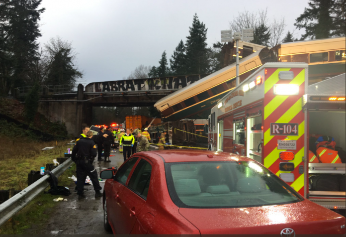 Two semi trucks involved in I-5 pileup caused by fatal Amtrak derailment