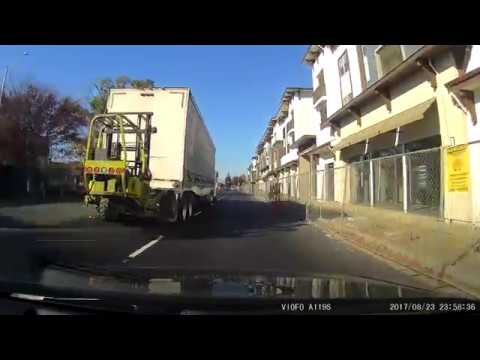 VIDEO: Truck making wide left turn flips SUV in middle lane