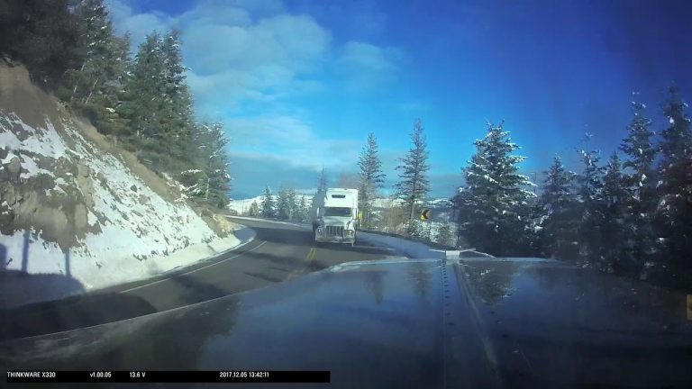 VIDEO: Near head-on collision between two semi trucks