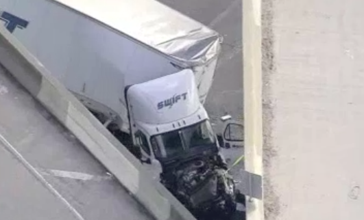 Semi truck flies off I-5 connector, causing multi-vehicle wreck on road below