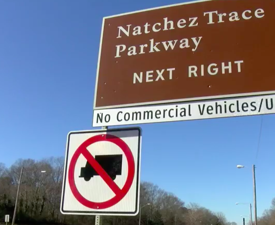 Park rangers hope new “picture” signs will keep truckers off Natchez Trace Parkway shortcut