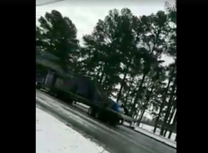 Semi truck (unsuccessfully) takes on icy hill in viral video