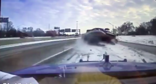 VIDEO: Tow truck driver nearly meets his maker
