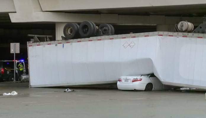Truck plummets off Texas overpass, lands on car