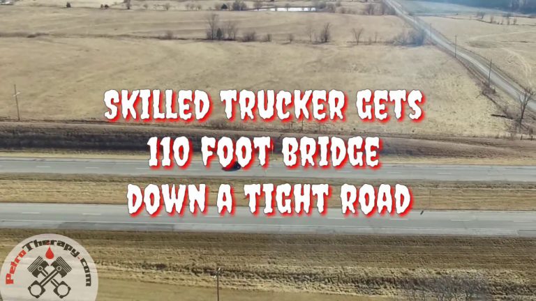 VIDEO: Skilled driver trucks a 110 foot bridge through tight turns