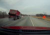 VIDEO: Runaway tire gives dump truck driver a scare