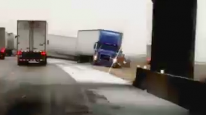 Multiple truck crash on icy I-40 caught on camera