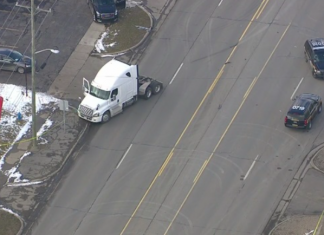 Former employee kills one at Michigan trucking company, steals semi at gunpoint, kills one other