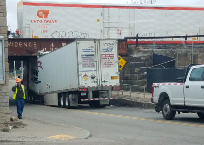 Truck is leaking hazmat after colliding with bridge, promoting evacuations