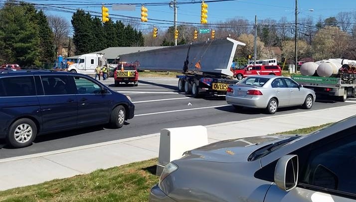 Bridge beam, semi blocks intersection after load shifts