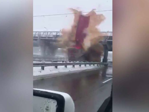 VIDEO: Dump truck explodes as it takes out pedestrian bridge