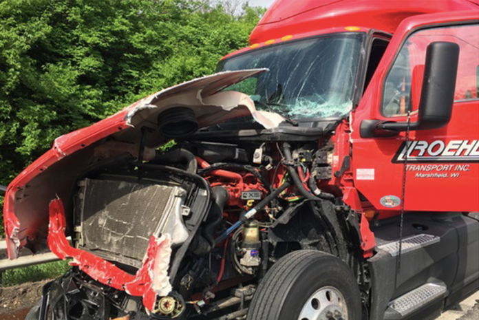 Motorist killed after crashing off overpass into the path of a tractor trailer