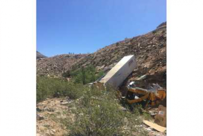 Truck driver found dead after crashing off I-15 down 80 foot crevasse