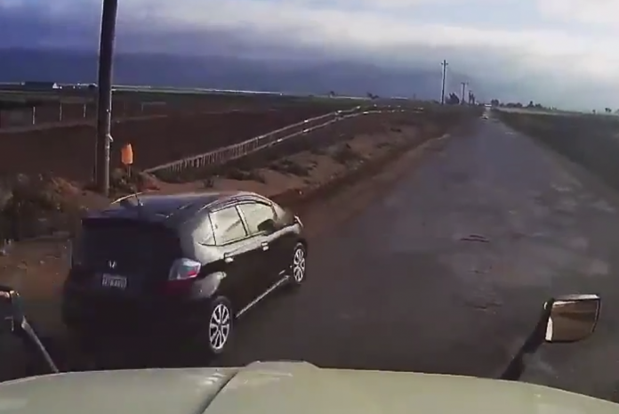 VIDEO: Car's impatience with semi truck nearly results in a nasty collision