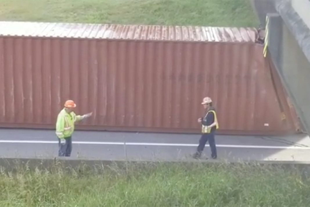 Truck loses container after hitting Highway 1 overpass