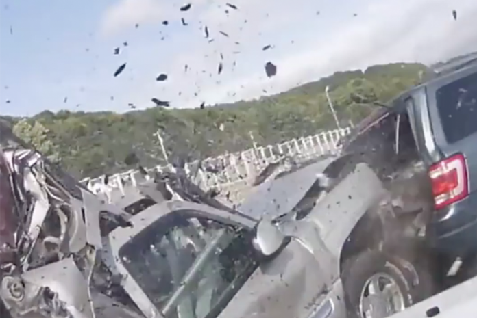 VIDEO: This insane crash left the semi truck's license plate wedged in the SUV driver's headrest