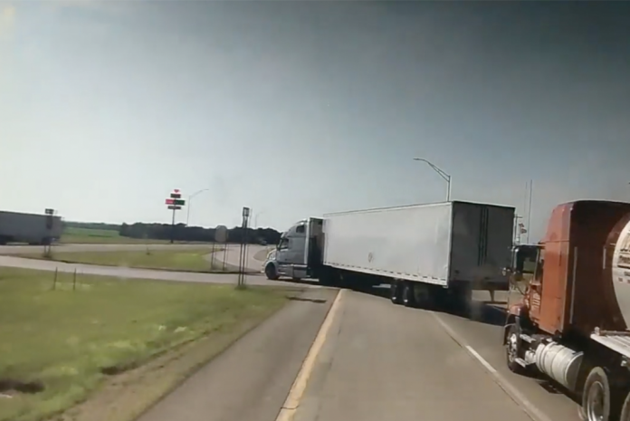 Iowa police shared incredible dash cam footage of a bone-headed driving maneuver that resulted in a serious two-truck crash.