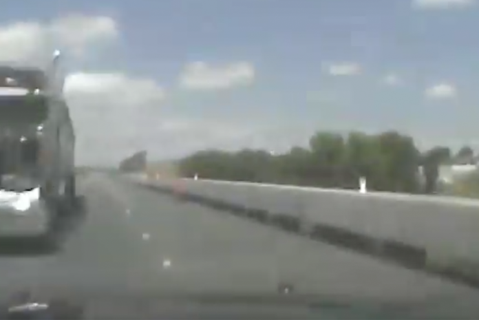 A Nebraska trooper has only a nanosecond to react when a truck crossed the center line in this dash cam video