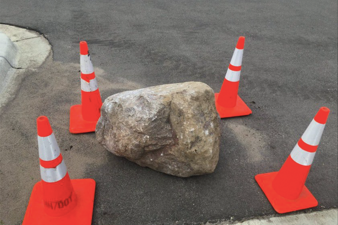 Mom and daughter fatally injured by 800 pound boulder that fell off truck